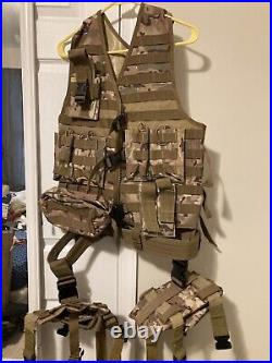 Multicam tactical vest with belt, holster, and bag